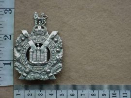 10549 King's Own Scottish Borderers cap badge (Ref. BBA 125)