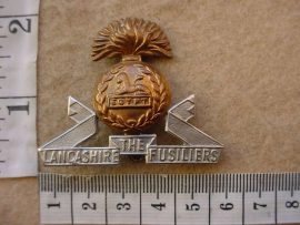 10584 Lancashire Fusiliers cap badge (Ref. BBA 189)
