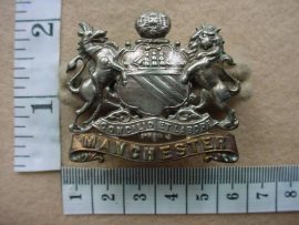 2507 Manchester Regiment cap badge (Ref. BBA 244)