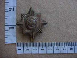 1852 Irish Guards cap badge (Ref. BBA 58)