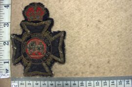 9997 Royal Rhodesia Regiment blazer badge, King's Crown (R cloth)