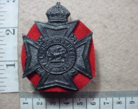 10719-1 Royal Rhodesia Regiment helmet badge, large size with lugs (CO2990)