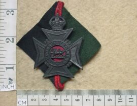 10719-4 1st Bn Rhodesia Regiment helmet badge, large size, flash backing (CO2990)